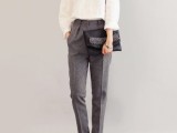 a white long sleeve top, grey pants, a black embellished clutch and blakc plus sheer flats