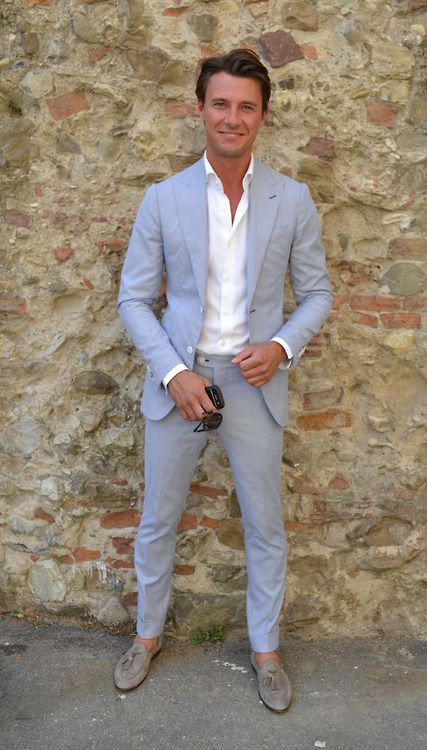 a powder blue suit, a white shirt, grey moccasins for a business casual work look