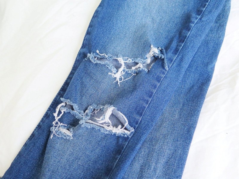 Picture Of trendy diy distressed knee jeans 2