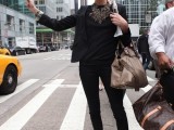 black skinnies, a black top, strappy shoes and a black blazer plus a statement necklace show off your legs at their best