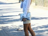 a white button down, neutral shorts to show off your legs, a metallic clutch and green shoes