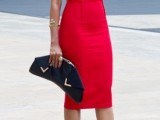 a red halter neckline bodycon midi dress, peep toe boots and a black clutch to rock